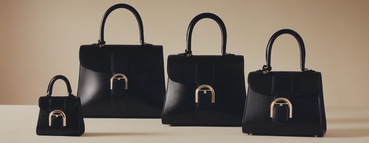 A visual of four bags in different sizes